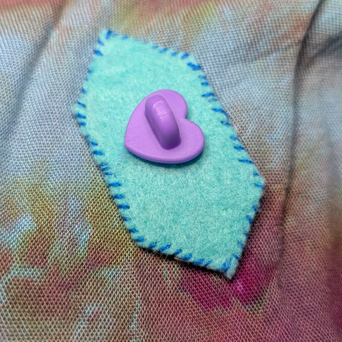 another blue gem brooch
