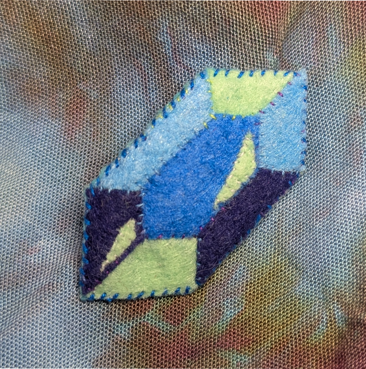 another blue gem brooch