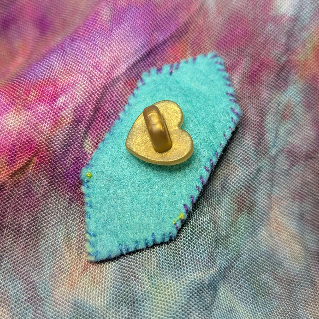 blue gem brooch