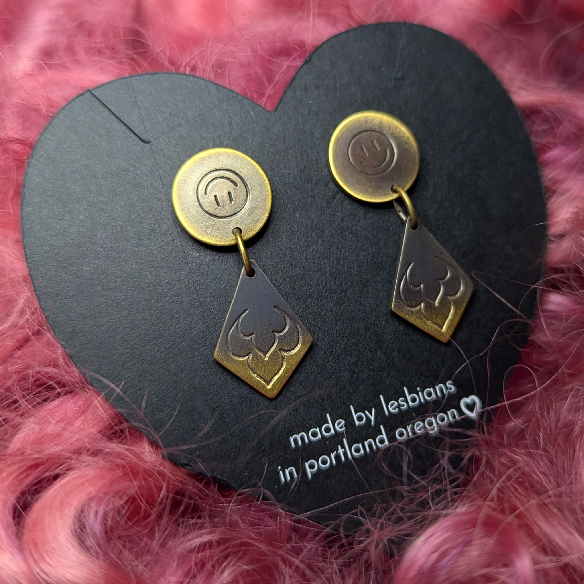 a comedy a tragedy: brass studs