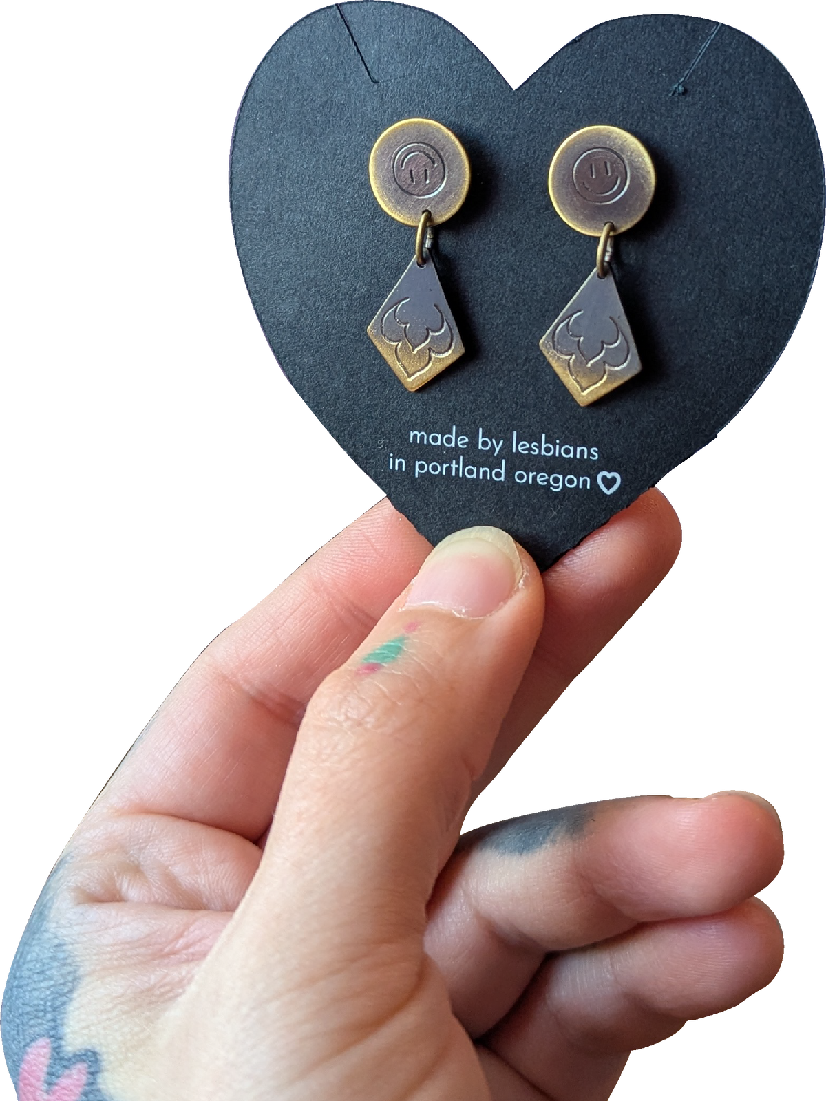 a comedy a tragedy: brass studs