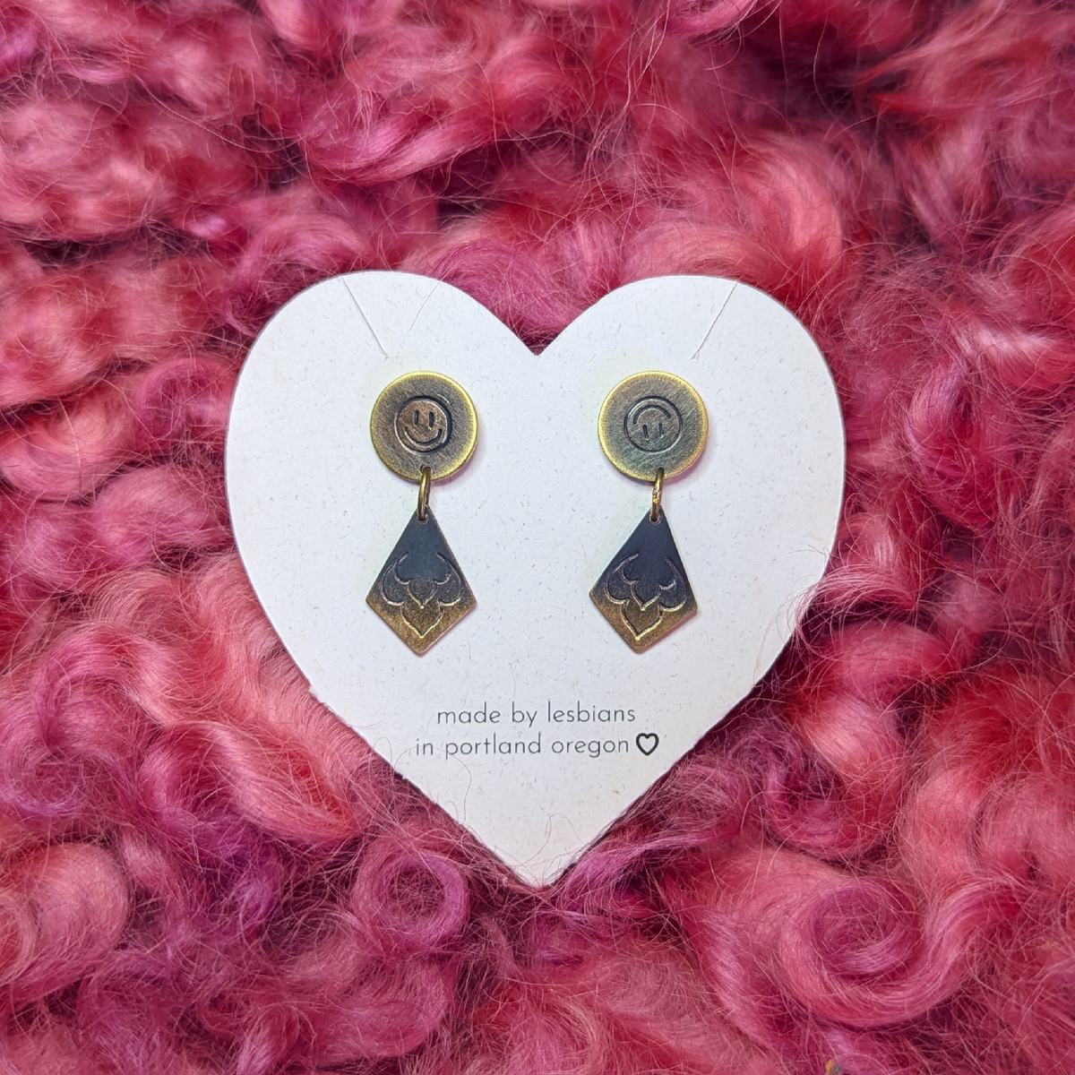 a tragedy a comedy: brass studs