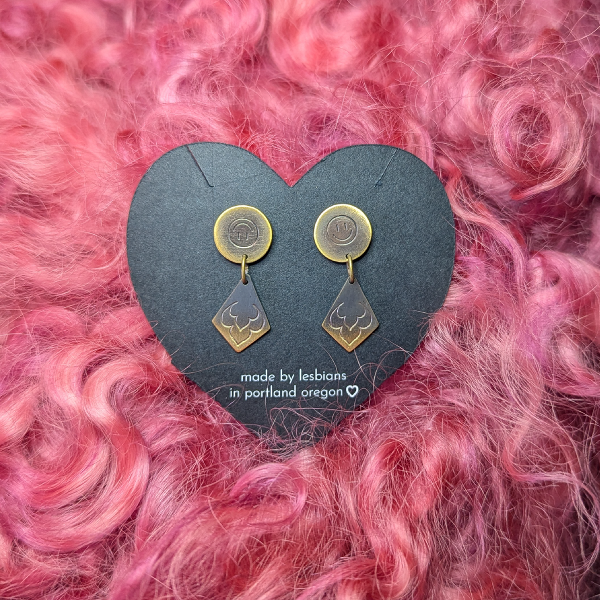 a comedy a tragedy: brass studs