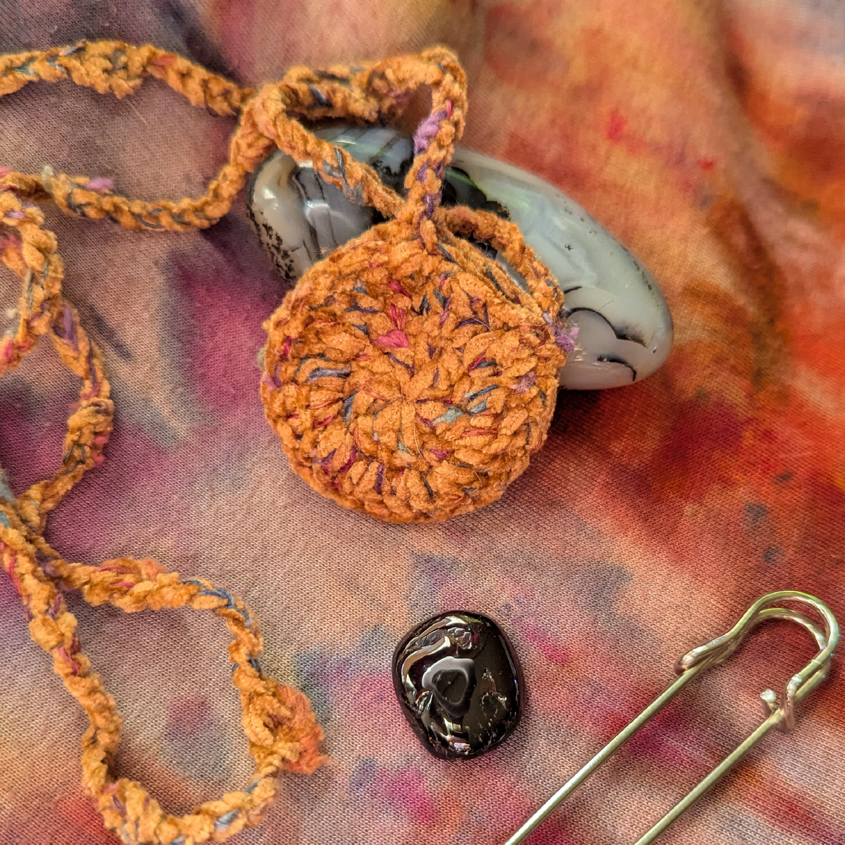 garnet and ochre amulet