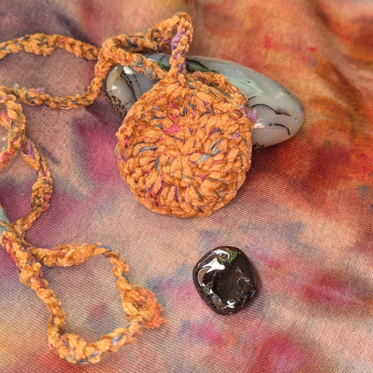 garnet and ochre amulet