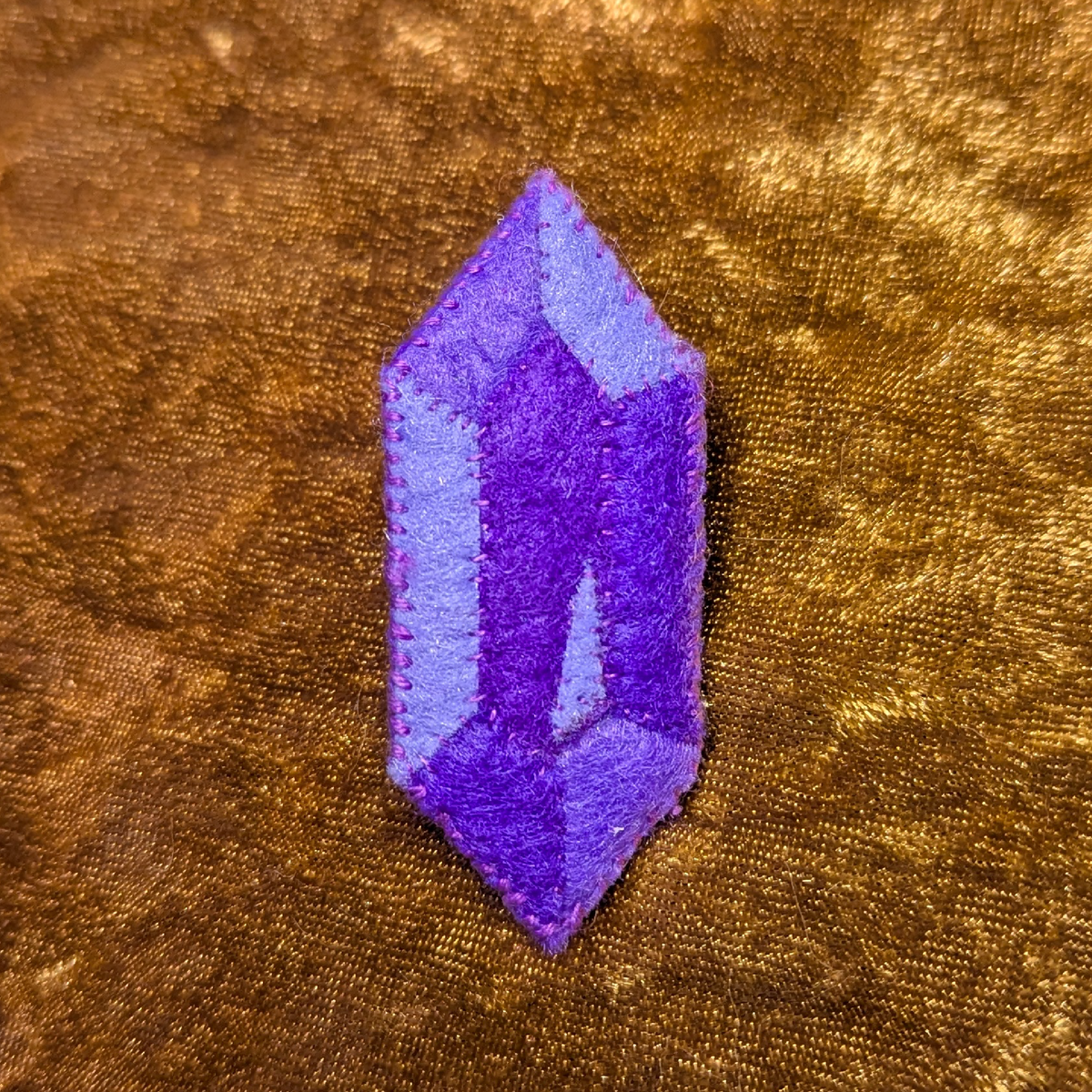 purple gem brooch