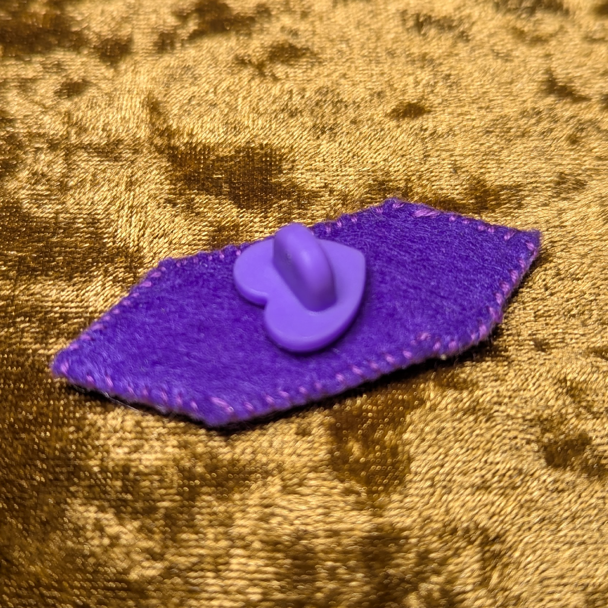 purple gem brooch